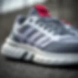 Close-up view of adidas Duramo SL sneakers showcasing design details