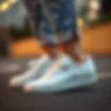 Classic design of Adidas white tennis shoes showcasing elegance