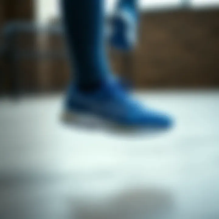 Athlete in Action with Asics Blue Shoes Athlete wearing Asics blue shoes during a workout