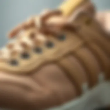 Close-up of beige sports shoes showcasing intricate details
