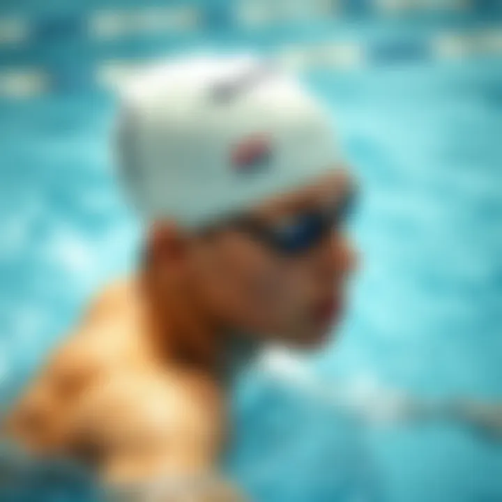 A swimmer in motion wearing a swim cap