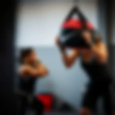 Usage of Nike Utility Speed Bag in Workout An athlete using the Nike Utility Speed bag during a workout session.