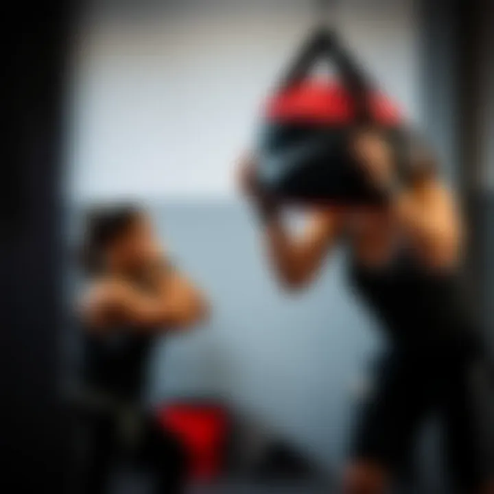 Usage of Nike Utility Speed Bag in Workout An athlete using the Nike Utility Speed bag during a workout session.