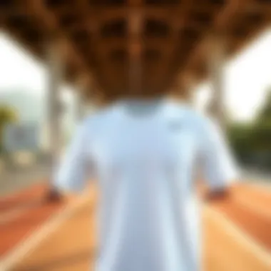 Nike white t-shirt showcased in a sporty outdoor setting.