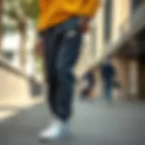 Stylish Puma ESS logo trousers showcased in a dynamic urban setting