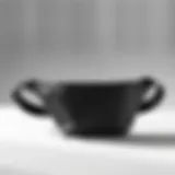 A stylish sport waist bag displayed on a minimalist background.